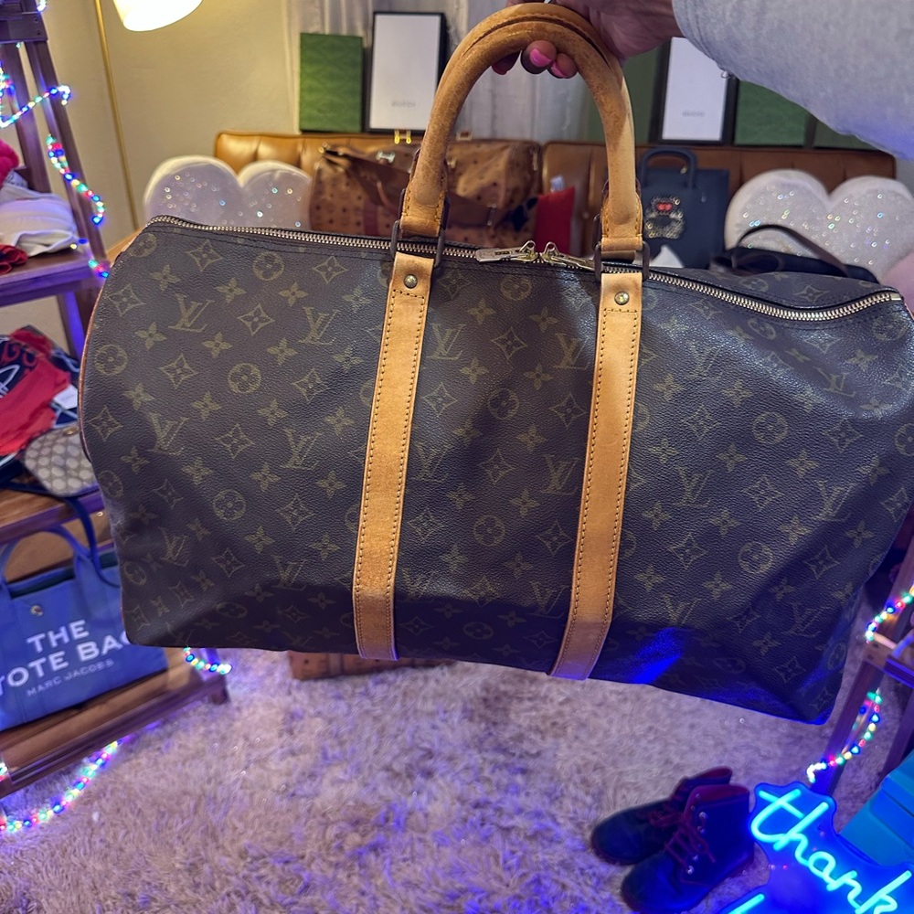 Louis Vuitton Monogram Canvas Carry-On Bag with Vachetta Leather Handles